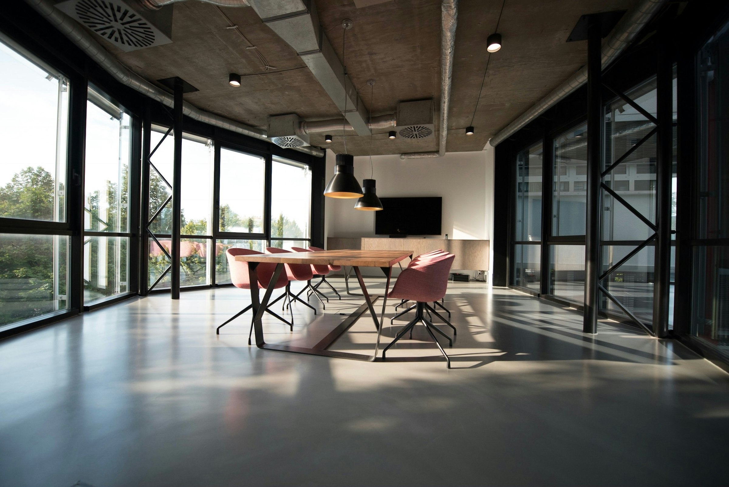 Modern commercial workspace with natural light and minimal furnishings